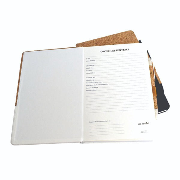 Open notebook with cork cover and pencil on a white background