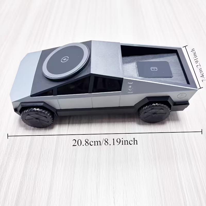 Small vehicle model with dimensions indicated on a light wooden surface