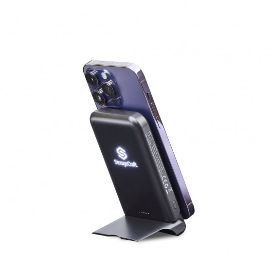 Smartphone with a charging stand on a white background