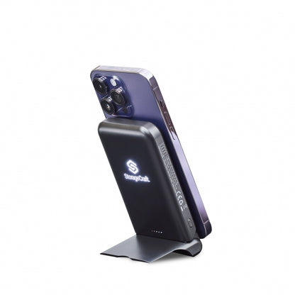 Smartphone with a charging stand on a white background