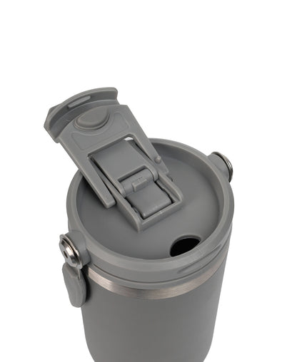 Gray insulated tumbler with a clip on lid on a white background