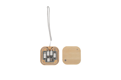 Rotating bamboo case with a set of USB adapters and cables, including Type-C, C-USB, C-micro, C-Lightning, and a 60W fast-charge cable, SIM-eject pin, and TF-slot. The case is closed with a lid showing a UV printed design.