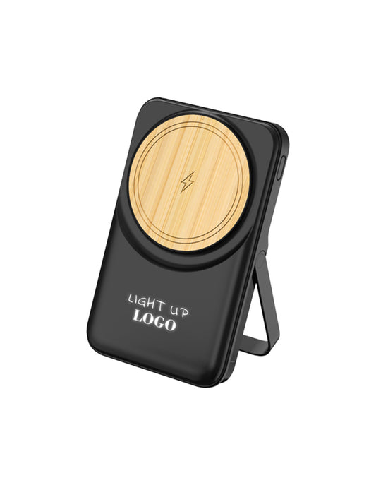 A black magnetic wireless charger with a bamboo detail and a foldable stand, branded with a placeholder logo.