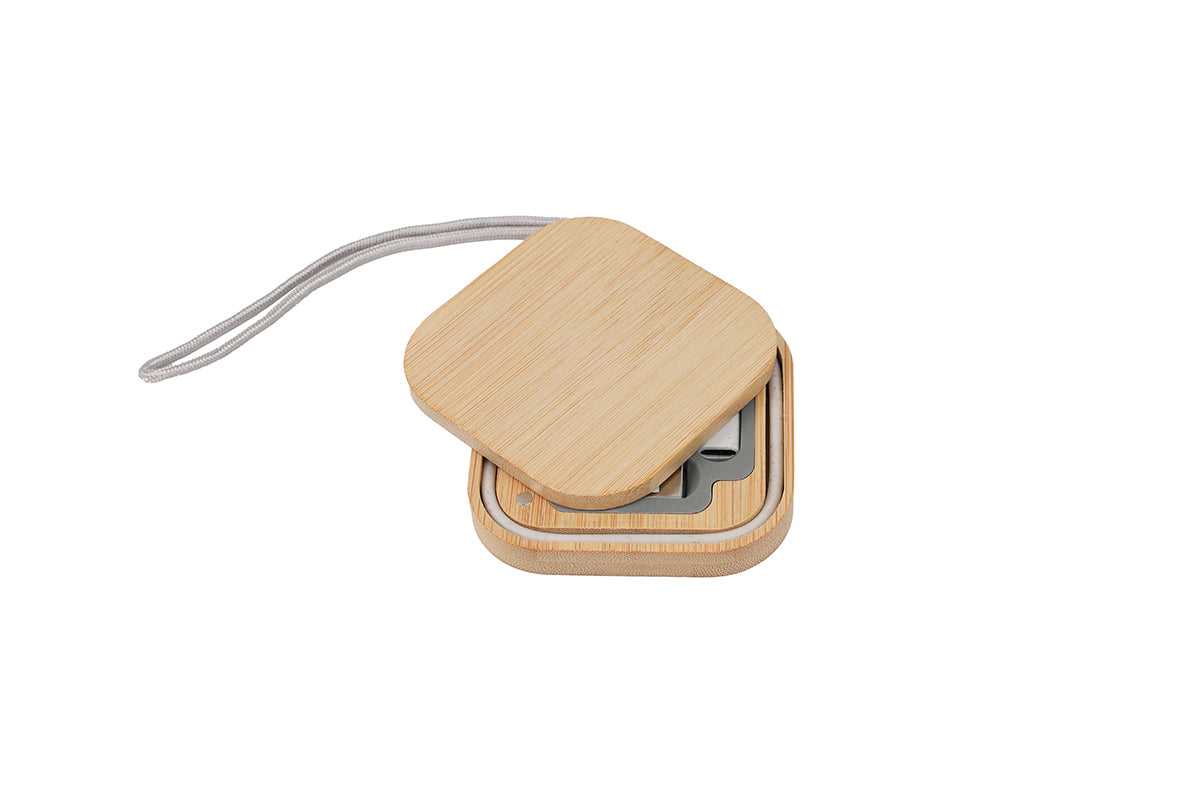 Wooden case with a strap on a white background