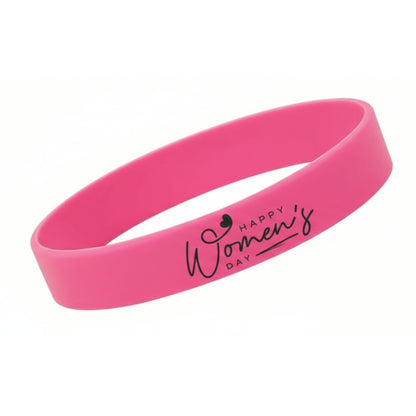 Pink wristband with 'Happy Women's Day' text on a white background