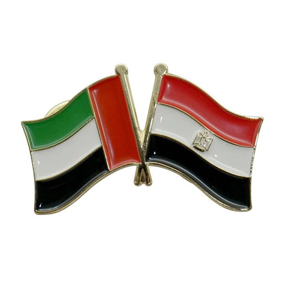 Pin with crossed flags of United Arab Emirates and Egypt on a white background