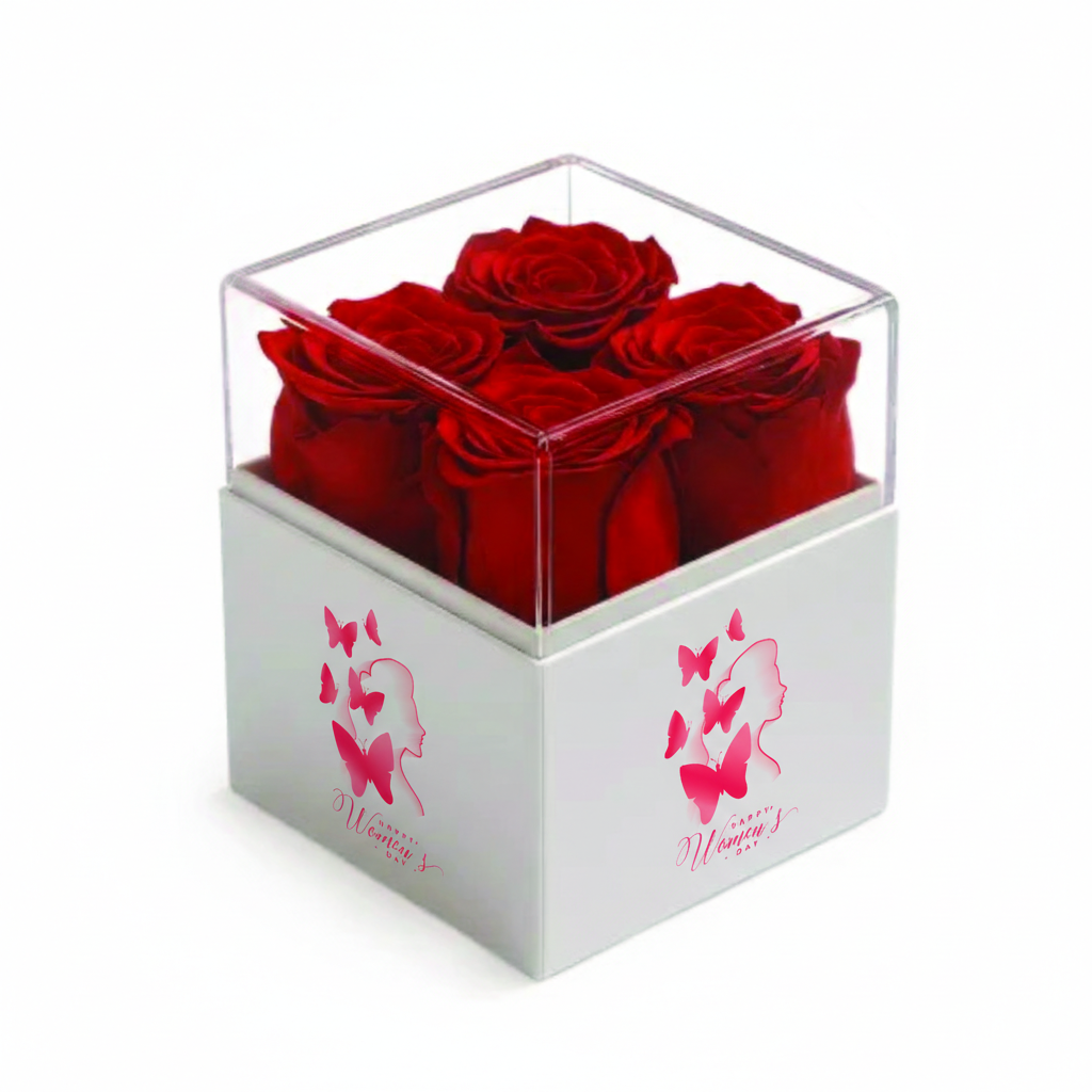 Clear cube box with red roses and pink butterfly design on a white background
