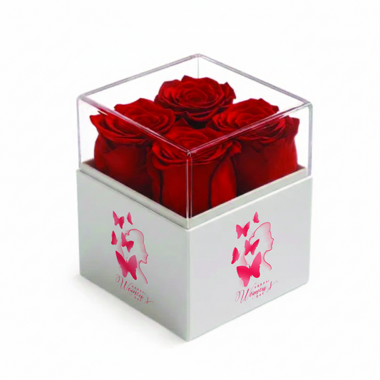 Clear cube box with red roses and pink butterfly design on a white background