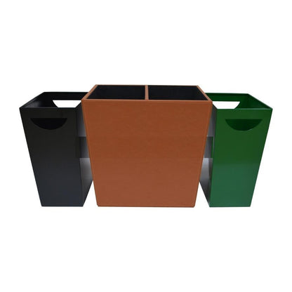 Three square metal planters in black, brown, and green on a white background