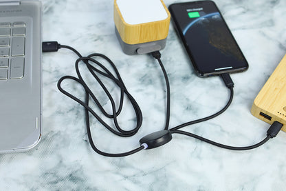 Laptop, smartphone, and power bank on a marble surface