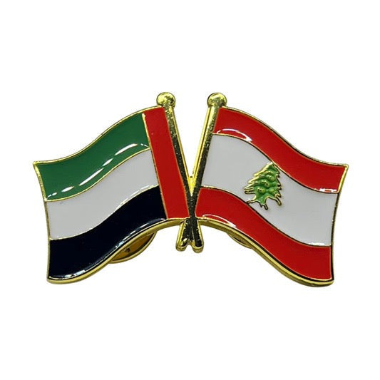 Pin with crossed flags of Iraq and Lebanon on a white background