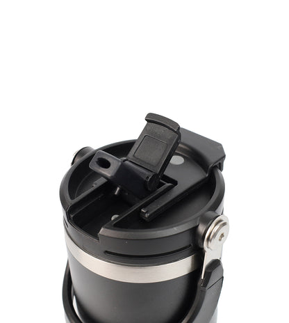 Black and silver travel mug with a lid on a white background