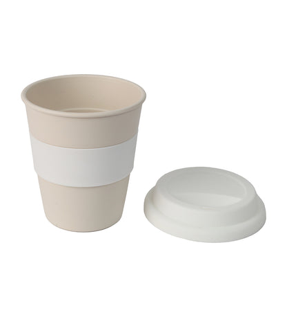 Beige reusable cup with a white sleeve and lid on a white background