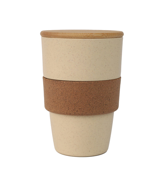 A beige wheat straw tumbler with a cork grip and a bamboo lid.