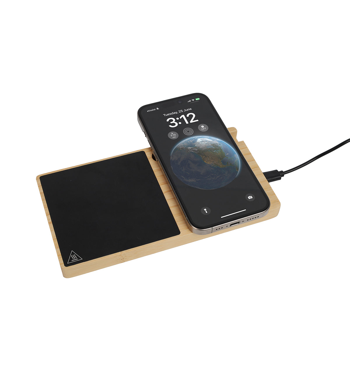 Smartphone on a wireless charging pad with a white background