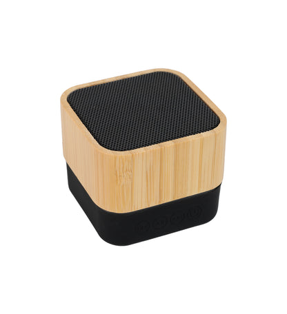 A bamboo Bluetooth speaker with a black top and base. The speaker has a square shape, with a visible mesh on the top surface and a bamboo panel on the sides.