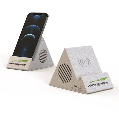 A beige pyramid-shaped Bluetooth speaker with a phone stand that has an input wireless charging feature. The device includes speaker grills on the sides.