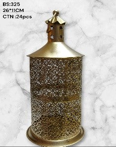 Decorative brass lantern with intricate patterns on a light gray background