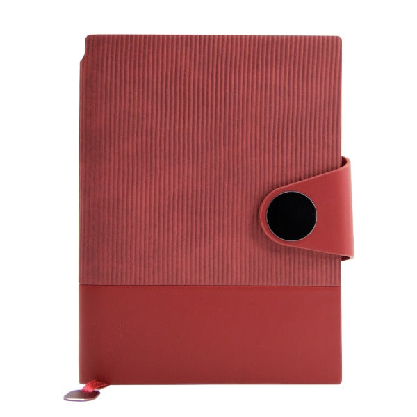 Red notebook with a circular strap on a white background