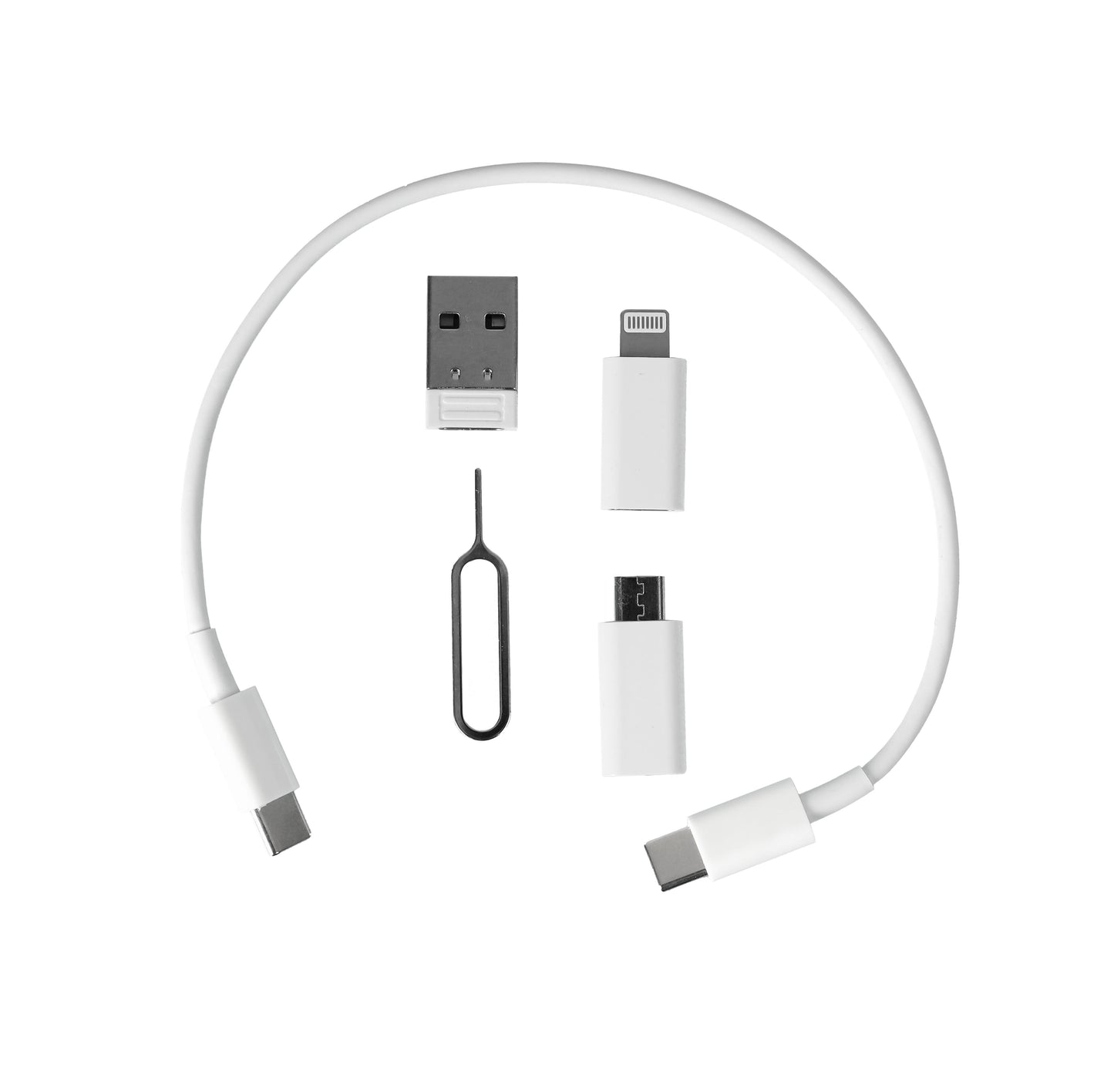 White travel-sized Mini Travel Cable Kit  with open lid on a brown surface