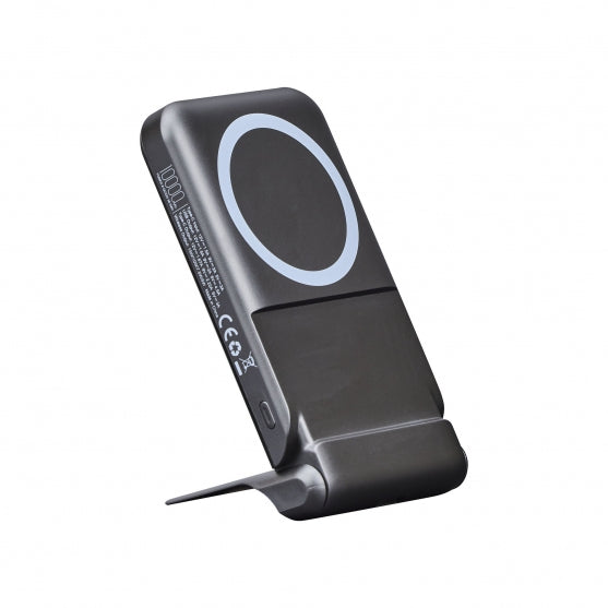 Black electronic device with a circular component on a white background