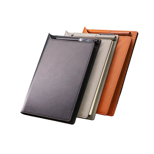 Three leather-bound books in black, beige, and brown on a white background