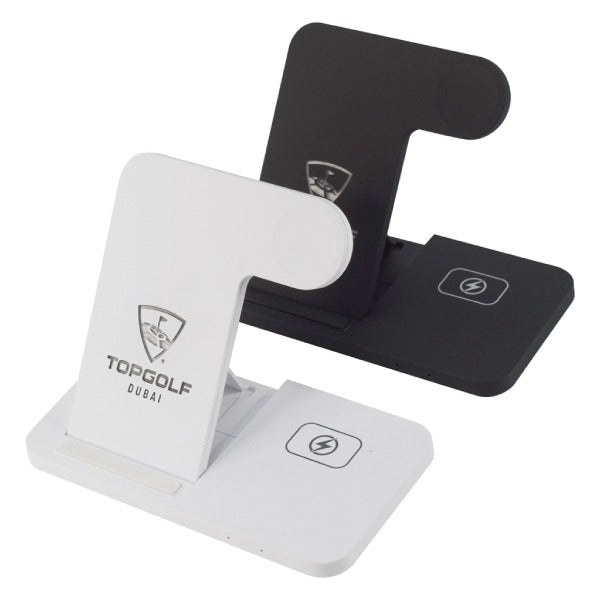 Two wireless charging stands, one white and one black, with Topgolf Dubai branding on a white background.