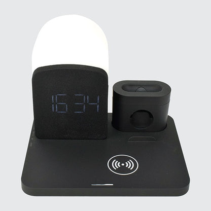 Black electronic device with digital display and wireless charging pad on a white background