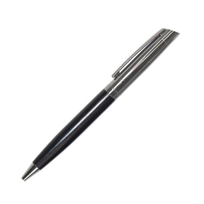 Black pen with silver accents on a white background