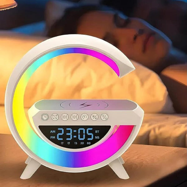 White alarm clock with digital display and dimensions on a white background