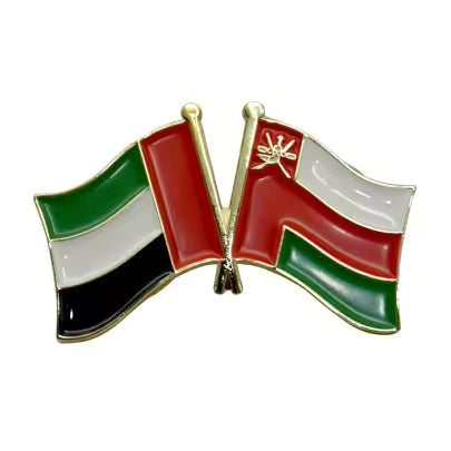 Pin with flags of United Arab Emirates and Oman on a white background