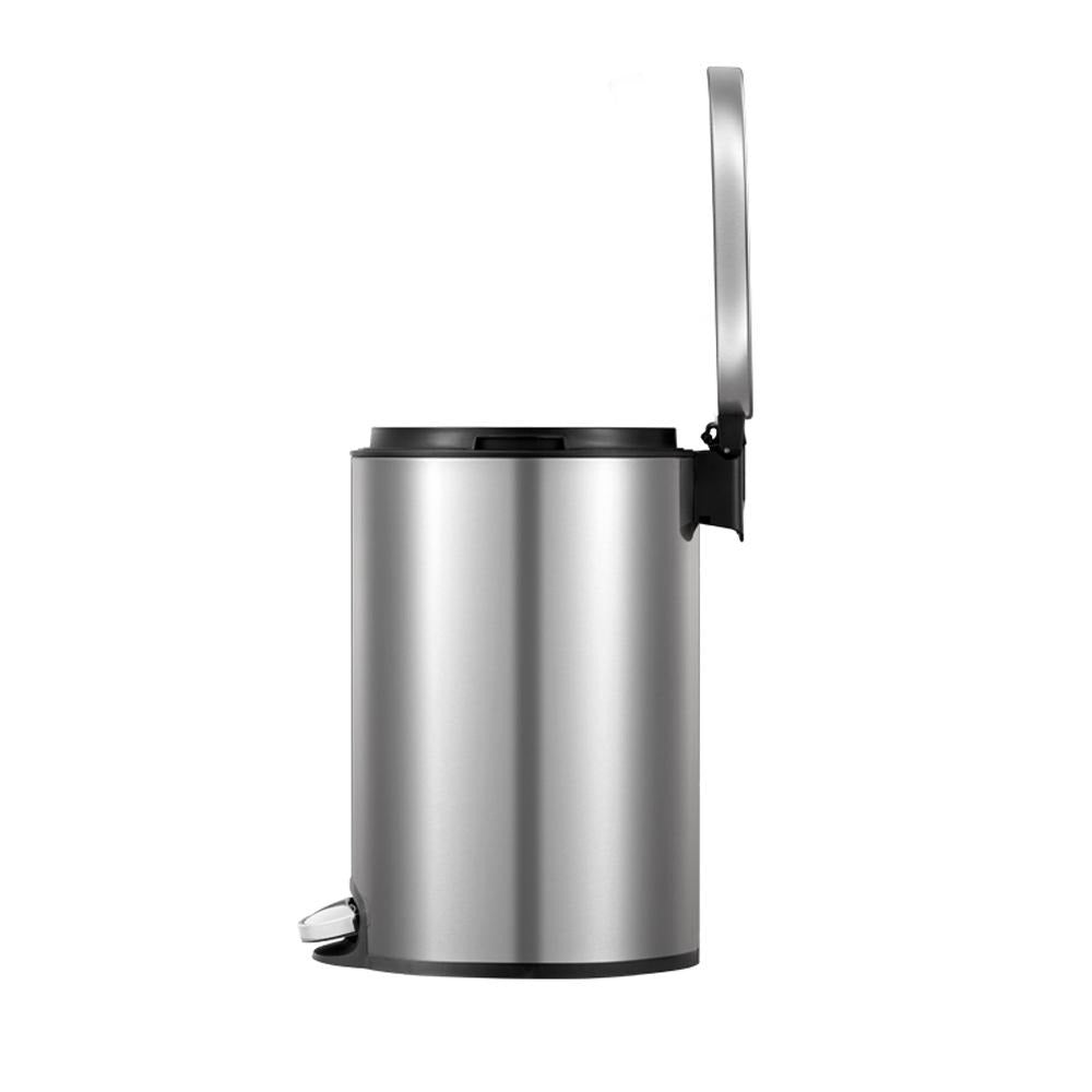 Stainless steel pedal bin with a black interior on a white background