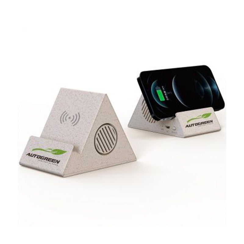 Triangular wireless charging pad with smartphone on a white background